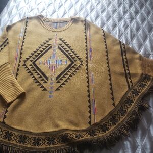 Geometric Patterned Poncho with Fringe